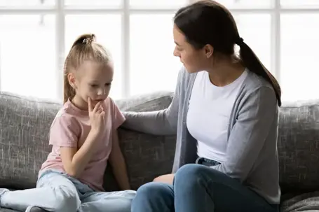 Mother having a conversation with daughter