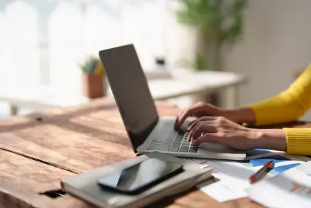 Person typing on computer