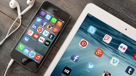 Ipad and Iphone with many apps