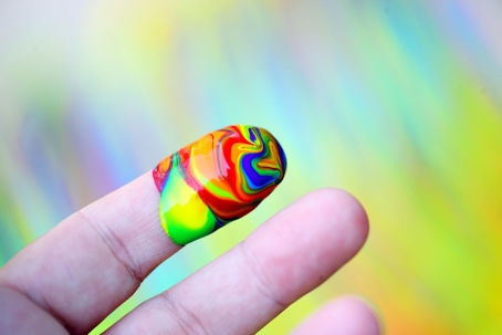 tie dye colors on a finger