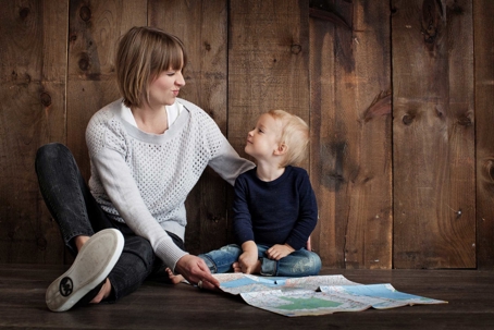 child and mother sitting together