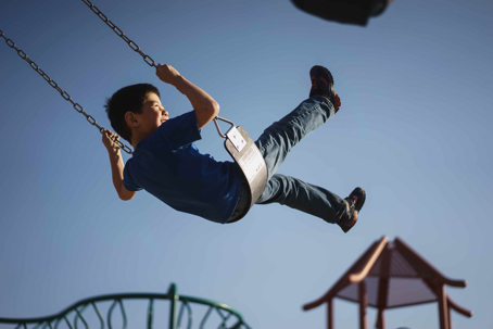 child on swings