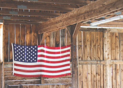 American Flag Hanging in Barn